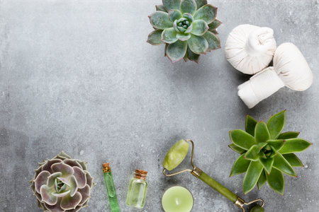 Spa and skin care homemade cosmetics. Bottles with spa cosmetic products on pastel background.の写真素材
