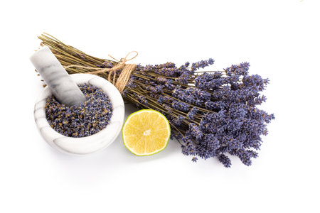 Natural cosmetics with lavender and orange, lemon for homemade spa on white background top view mock up.の写真素材