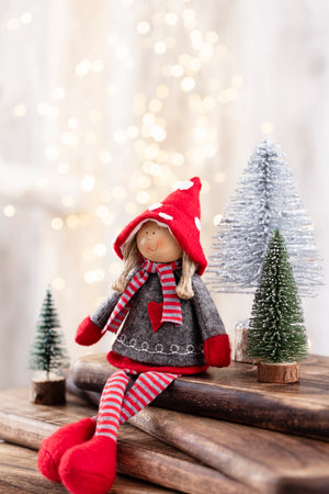 Christmas tree on wooden, bokeh background. Christmas holiday celebration concept. Greeting card.の写真素材