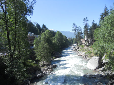 a  rapid river flow in the townの写真素材