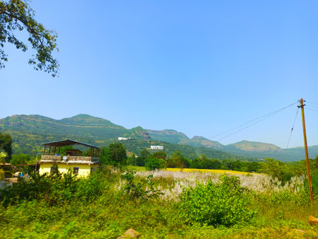 Mountain view with blue sky and white clouds at Chiangrai province, Thailand.の写真素材