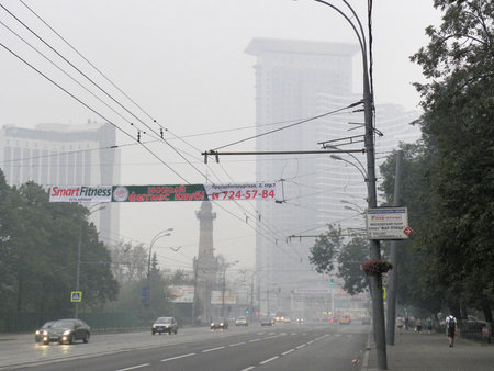 Sokolniki District, Moscow, Russia - August 8, 2010 - Because of abnormal heat this year peatbogs are on fire in Moscow Region and some other regions of Russia, therefore there is dense smog over some cities, and over Moscowのeditorial素材