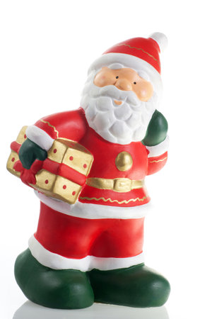 statuette of Santa Claus with a giftの写真素材