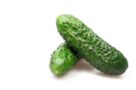 Green fresh cucumber isolated on white backround .の写真素材