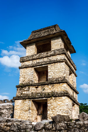 Ruins over a blue sky at the Palenque archeological site, Chiapas, Mexico.の写真素材