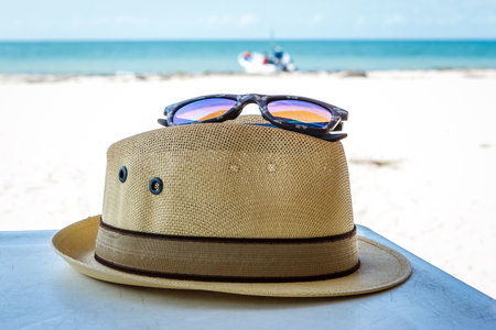 Sunglasses and panama hat at the beach, Celestun, Yucatan, Mexicoの写真素材