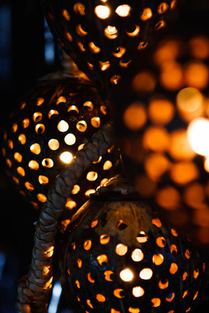 Detail of some coconut shell lamps at the Chatuchak weekend market, Bangkok, Thailand.の写真素材