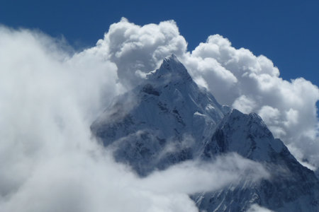 Scenic view of Mount Ama Dablam with big clouds and blue sky, seen from Thokla pass, Everest Base Camp trek, Nepalの写真素材
