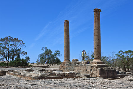 Ptolemais, Libya - April 15, 2009: A visitor between the columns of the archaeological siteのeditorial素材
