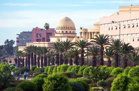 Marrakech, Morocco - March 24, 2006: The Real Theater with people walking in the gardenのeditorial素材