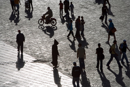 Marrakech, Morocco - March 26, 2006: A crowd of local people and tourists in the famous Jemaa el Fna square.のeditorial素材