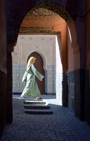 Marrakech, Morocco - March 22, 2006: A lady walking in the Medina quarterのeditorial素材
