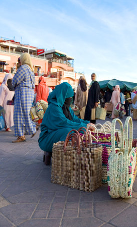 Marrakech, Morocco - March 23, 2006: Local seller in the famous Jemaa el Fna square.のeditorial素材