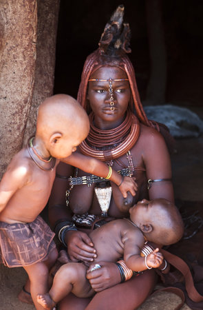 Kaokoland, Namibia - December 9, 2009: Scene of life in a Himba villageのeditorial素材