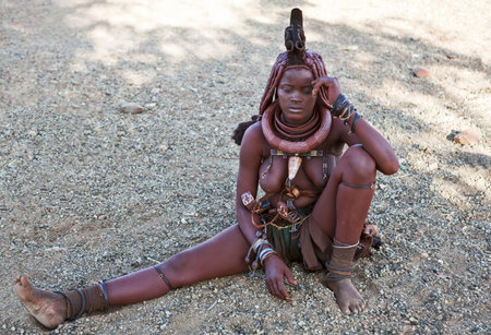 Kaokoland, Namibia - December 9, 2009: A young local woman in a Himba villageのeditorial素材