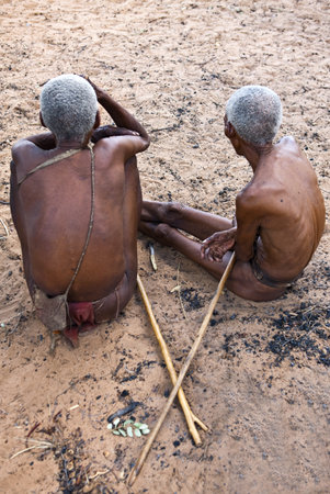 Ovamboland, Namibia - December 12, 2009: Grashoek area, scenes of life in a village bushmenのeditorial素材