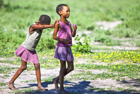 Owamboland, Namibia - December 12, 2009: Grashoek region, scenes of life in a village bushmenのeditorial素材