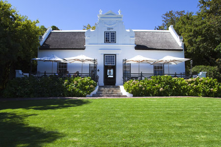 Cape town, South Africa - March 5, 2010: Stellenbosh area, the main house of the Zewenwatch wine farmのeditorial素材