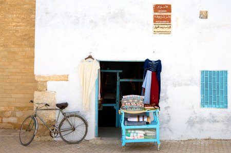 Kairouan, Tunisia - May 5, 2007:  A very simple shop with bycicle in  the Medina