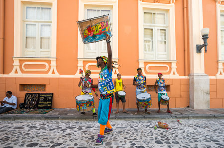 Salvador, Brazil - September 14, 2013: The Pelourinho district, traditional drummers in Porta dos Carmo streetのeditorial素材