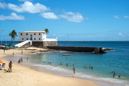 Salvador, Brazil - September 11, 2013:  Barra district, people on the beach near the Santa Maria fortressのeditorial素材