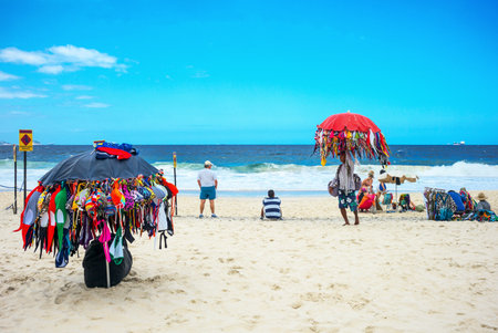 Rio De Janeiro, Brazil  - September 6, 2013: People in Copacabana beach in a cloudy dayのeditorial素材