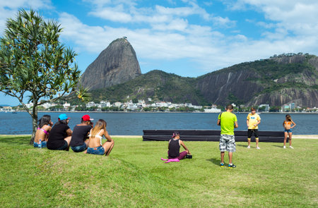 Rio De Janeiro, Brazil  - September 7, 2013:  Young people on the Flamengo beachのeditorial素材