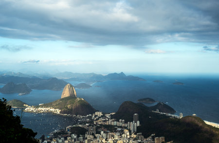 Brazil, Rio De Janeiro, panorama of the city seen from the Corcovado in a cloudy dayのeditorial素材