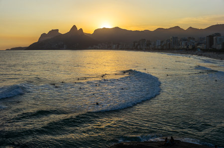Brazil, Rio De Janeiro, the Ipanema bay seen from the Pedra do Arpoador promontory at sunsetの写真素材