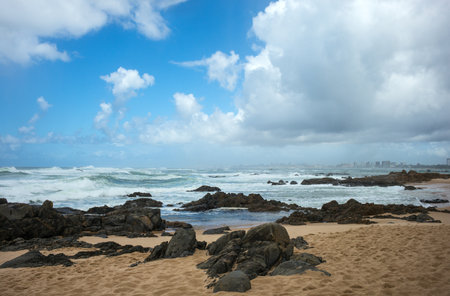 Brazil, Salvador, view of the rough sea near the Farol De Itapua (lighthouse)の写真素材