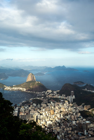 Brazil, Rio De Janeiro, panorama of the city seen from the Corcovado in a cloudy dayの写真素材