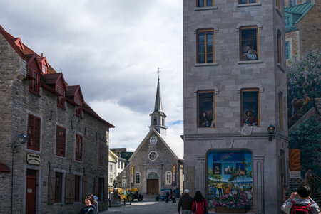 Quebec city, Canada - May 5, 2014: The Notre Dame church and murals in the old townのeditorial素材