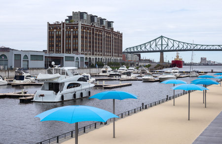 Montreal, Canada - May 13, 2014: Quebec, the old harbour with the bridge in the backgroundのeditorial素材