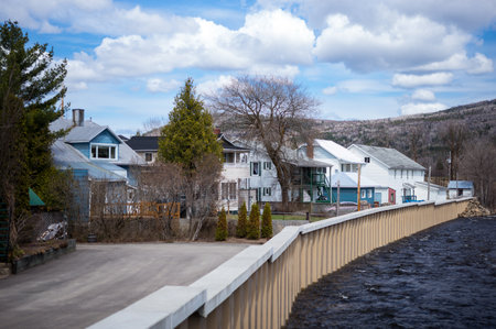 Quebec, Baie Saint Paul, houses on the river in the town outskirtsの写真素材