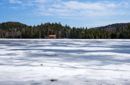 Quebec, Baie des Rochers, the still frozen lakeの写真素材