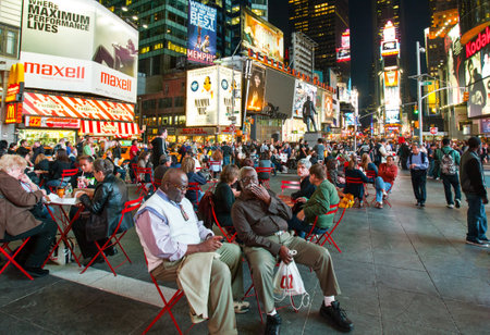New York, U.S.A. - October 9, 2010:  Manhattan, people and neon sign  in Times Square areaのeditorial素材