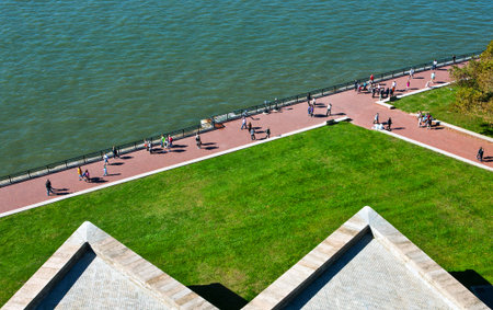 New York, U.S.A. - October 8, 20010: Tourists walking on the basement of the Liberty statueのeditorial素材