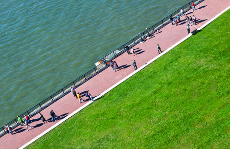 New York, U.S.A. - October 8, 20010: Tourists walking on the basement of the Liberty statueのeditorial素材
