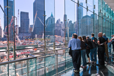 New York, U.S.A. - October 9, 2010: Manhattan, people looking at the Ground Zero from World Financial Centerのeditorial素材