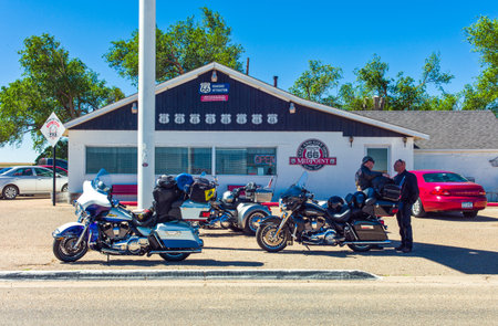Adrian, U.S.A. - May 21, 2011: Texas, people and motorcycles in front of  the Mid Point Cafe on the Route 66のeditorial素材
