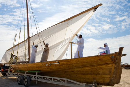 Abu Dahbi,  U.A.E. - February 22, 2007:  Preparation works of feluccas racing in the Marina Sporting...
