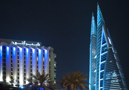 Manama, Bahrain - February 17, 2009: Night view of the architectures of the Trade World Center towers.のeditorial素材