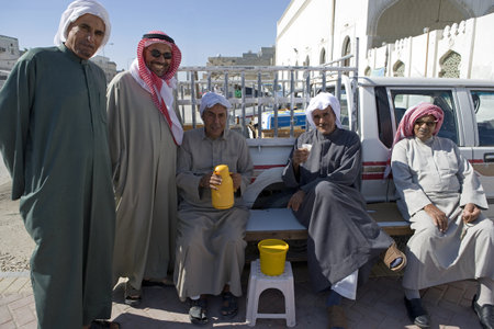 A'Ali,  Bahrain - December 12, 2006:  Local people in coofee-breack near the earthenware factory of...