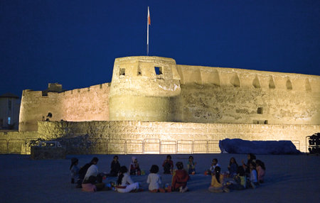 Muharraq,  Bahrain - December 5, 2006: People in  the islamic Arad Fort of the XV century.のeditorial素材