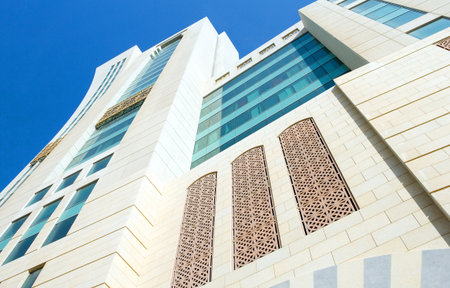 Manama, Bahrain - January 10, 2007: Upward view of the modern architectures in the city center.のeditorial素材