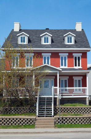 Trois Rivieres, Canada - May 12, 2014: Quebec, a typical house in Forges street.のeditorial素材
