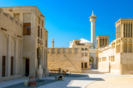 Dubai, U.A.E. - November 11, 2006:  Wind towers and mosque in the old Bastakija quarterのeditorial素材