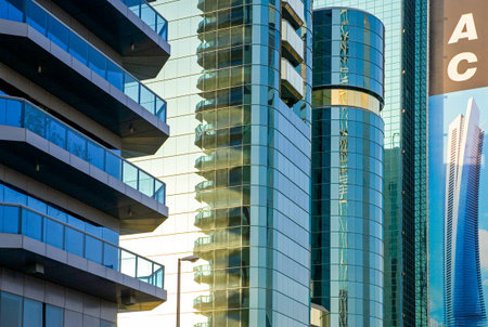 Dubai, U.A.E. - November 15, 2006: Reflrctions on the  architectures of the business area of the  Sheik Zaied Road.のeditorial素材
