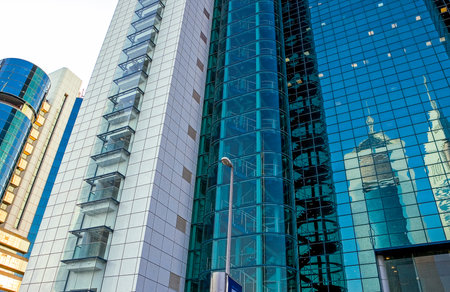 Dubai, U.A.E. - November 15, 2006: Reflrctions on the  architectures of the business area of the  Sheik Zaied Road.のeditorial素材