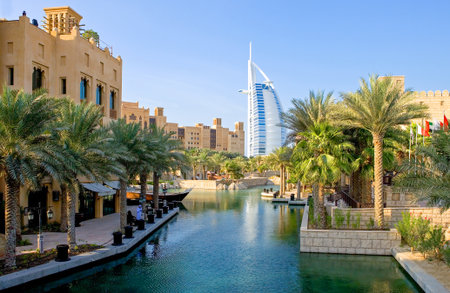 Dubai, U.A.E. - November 12, 2006: The channel of the Madinat Jumeirah resort, in the background the Burj Al Arab towerのeditorial素材